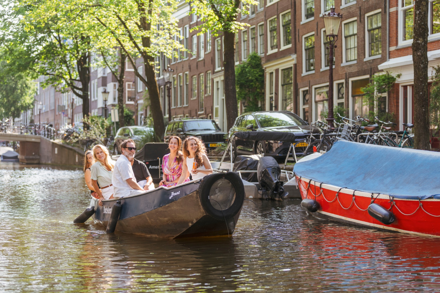 Family boating through Amsterdam